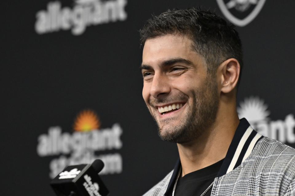 Las Vegas Raiders' Jimmy Garoppolo smiles as he talks after an NFL football game against the Green Bay Packers Monday, Oct. 9, 2023, in Las Vegas. The Raiders won 17-13. (AP Photo/David Becker)