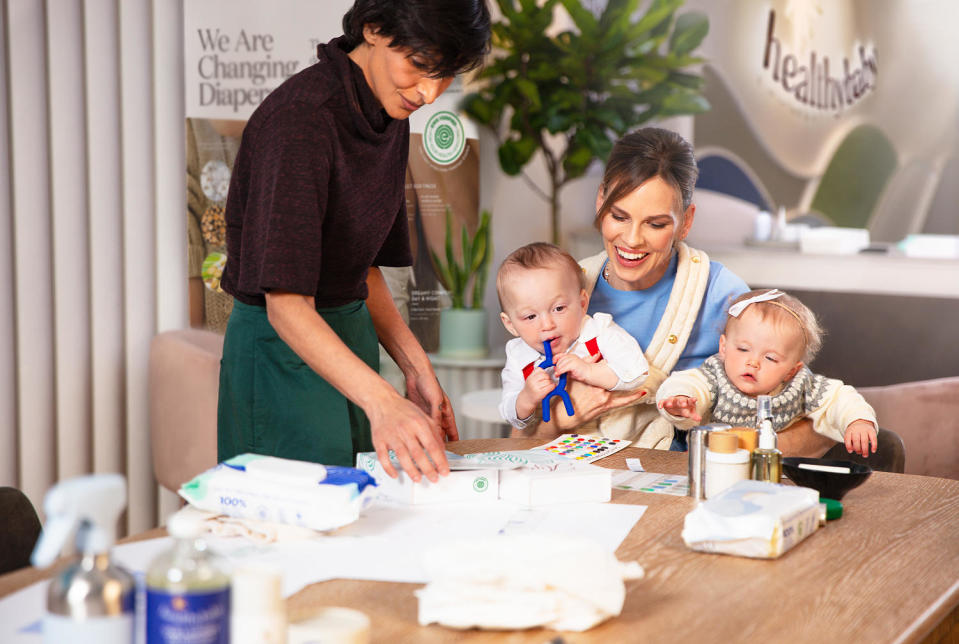 HealthyBaby's Shazi Visram with Hilary Swank holding her twins, Ohm and Aya. (Courtesy Chris Sojka for HealthyBaby)