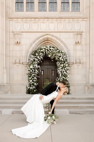 <p><a href="https://www.instagram.com/ivoryandbliss/" data-component="link" data-source="inlineLink" data-type="externalLink" data-ordinal="1">@ivoryandbliss</a></p> Brock Purdy and Jenna Purdy kissing in front of wedding venue.