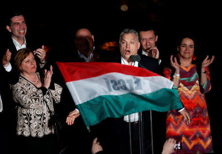 Hungarian Prime Minister Viktor Orban addresses supporters after the announcement of the partial results of parliamentary election in Budapest, Hungary, April 8, 2018. REUTERS/Bernadett Szabo