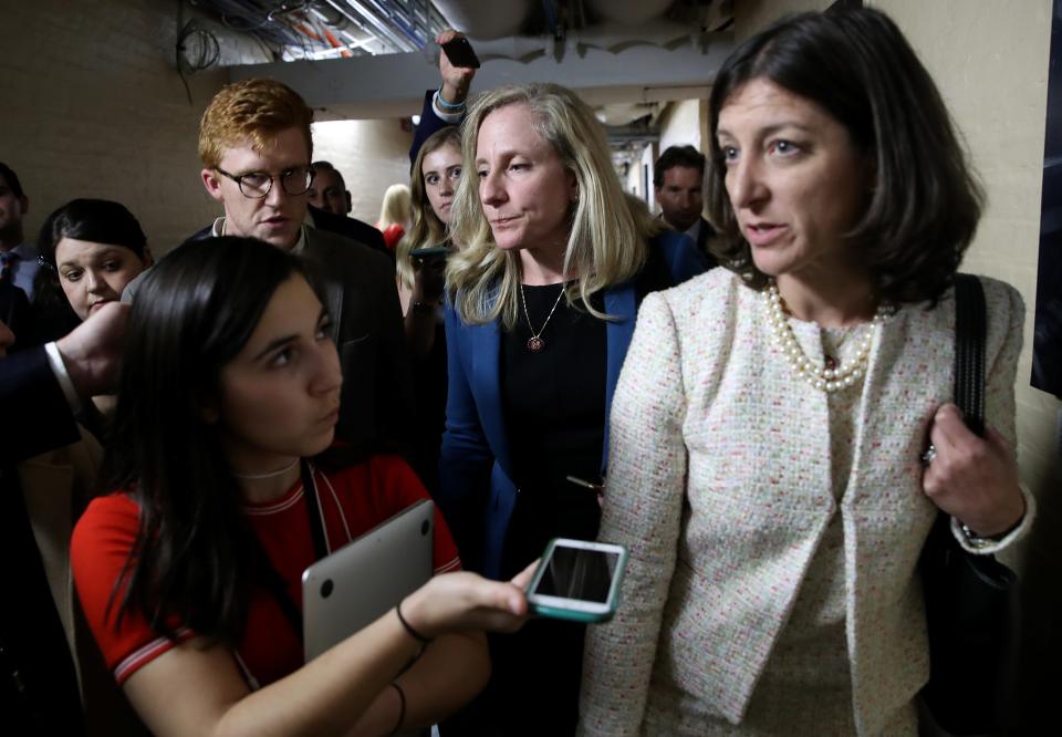 Virginia Democratic Reps. Abigail Spanberger, center, and Elaine Luria, right, leave a House caucus meeting Sept. 24 at the U.S. Capitol where formal impeachment proceedings against President Donald Trump were announced by House Speaker Nancy Pelosi.