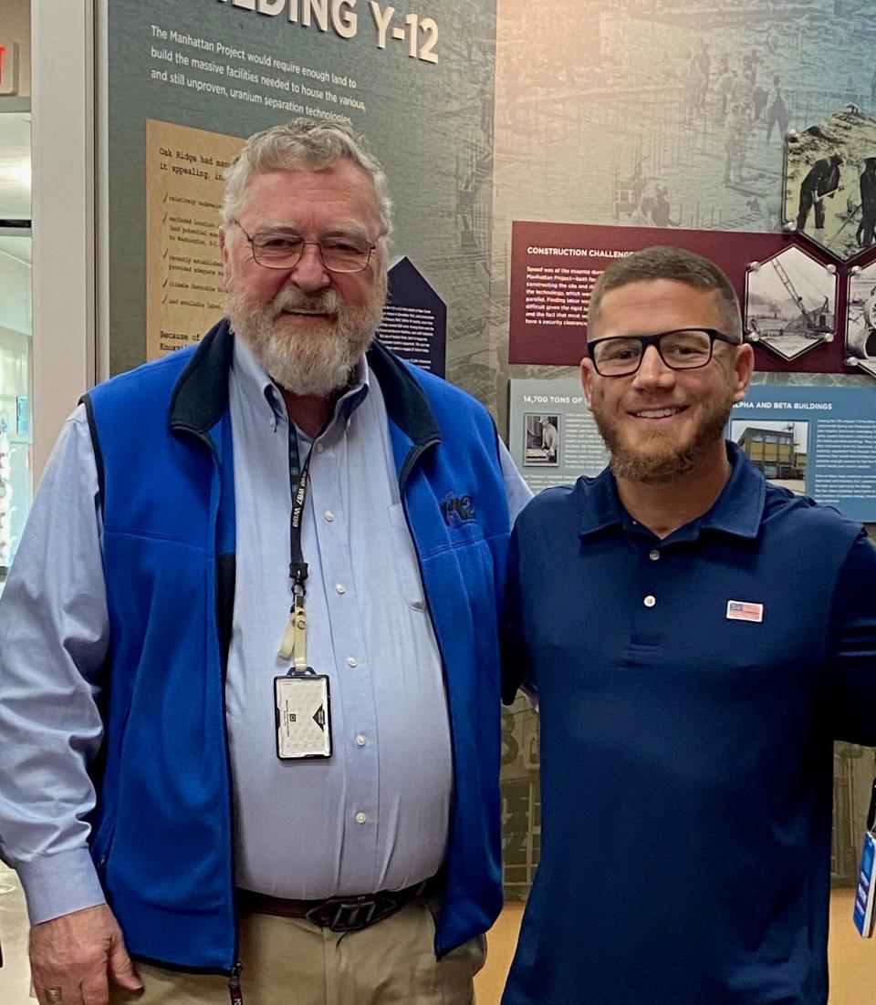 Kyle Carpenter, right, with D. Ray Smith at the Y-12 History Center where they recorded the podcast.