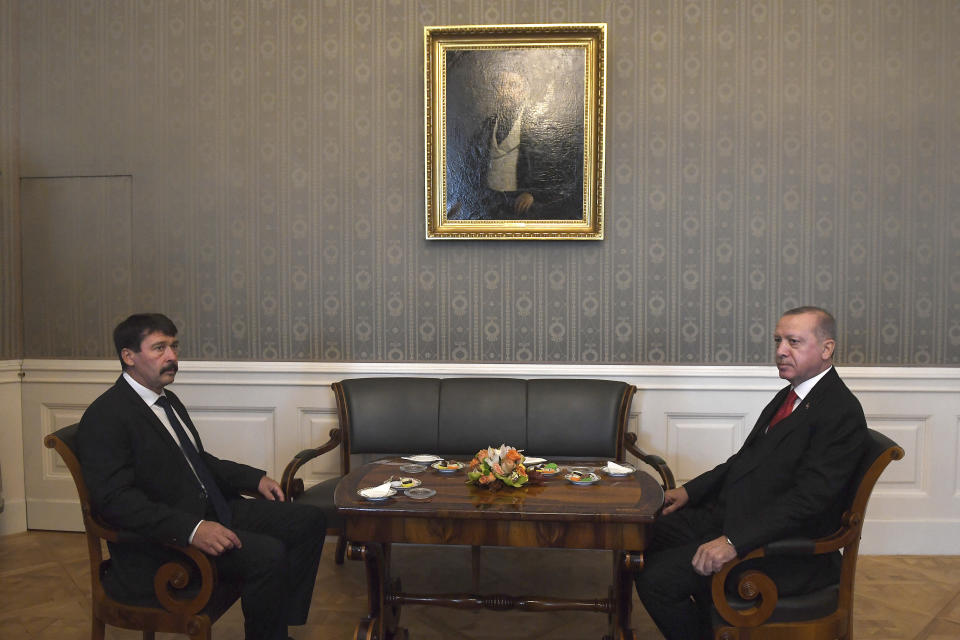 Turkish President Recep Tayyip Erdogan, right, and Hungarian President Janos Ader during their meeting in the presidential Alexander Palace in Budapest, Hungary, Thursday, Nov. 7, 2019. (Tibor Illyes/MTI via AP)