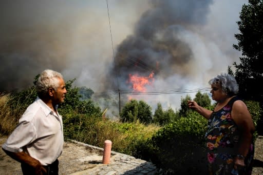 In the southern Portuguese holiday region, residents and tourists have been evacuated from around an Algarve resort town as fire crews struggled to extinguish wildfires that have left 30 people injured, one seriously