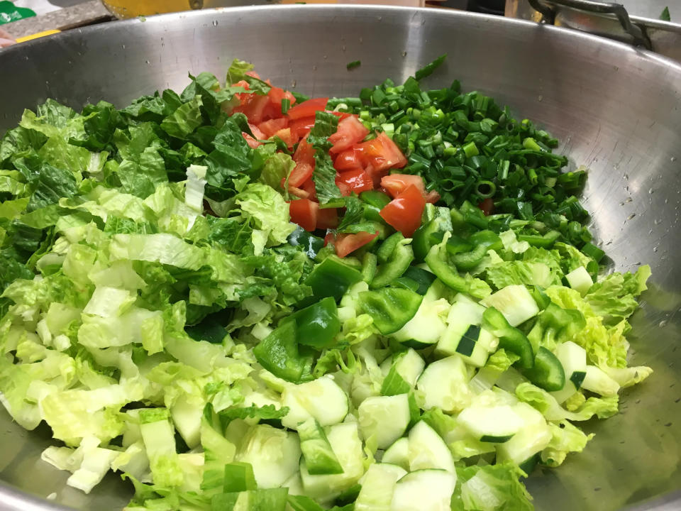 In this Herald News file photo from 2019, the ingredients for salads are placed in a bowl for the Lebanese mahrajan at St. Anthony of the Desert in Fall River.