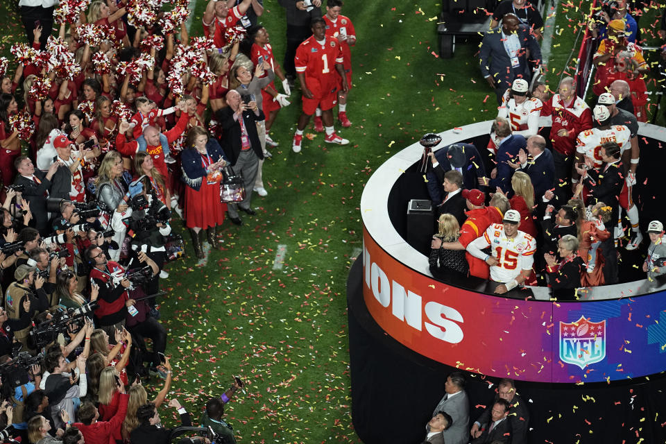 Kansas City Chiefs general manager Brett Veach holds the Vince Lombardi Trophy after the NFL Super Bowl 57 football game against the Philadelphia Eagles Sunday, Feb. 12, 2023, in Glendale, Ariz. The Kansas City Chiefs defeated the Philadelphia Eagles 38-35. (AP Photo/David J. Phillip)