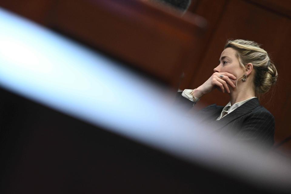 Amber Heard looks on in the courtroom at the Fairfax County Circuit Courthouse in Fairfax, Va., on May 17, 2022.