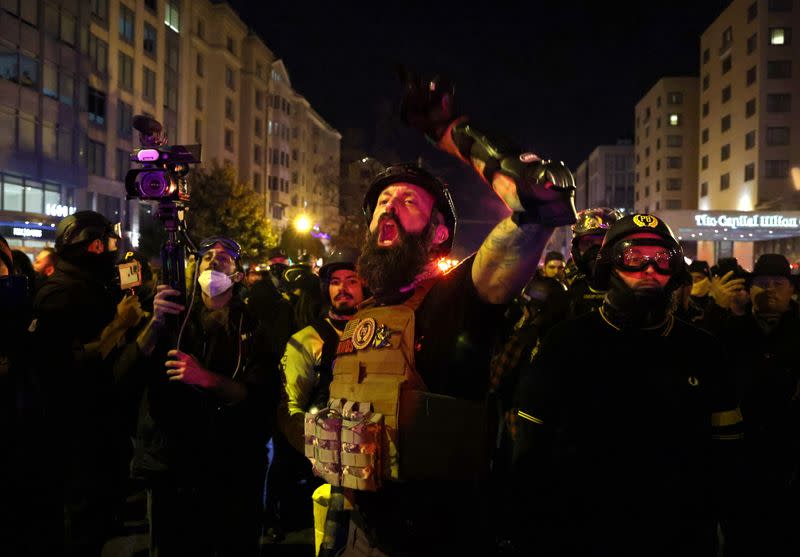 People take part in a rally to protest the results of the election, in Washington