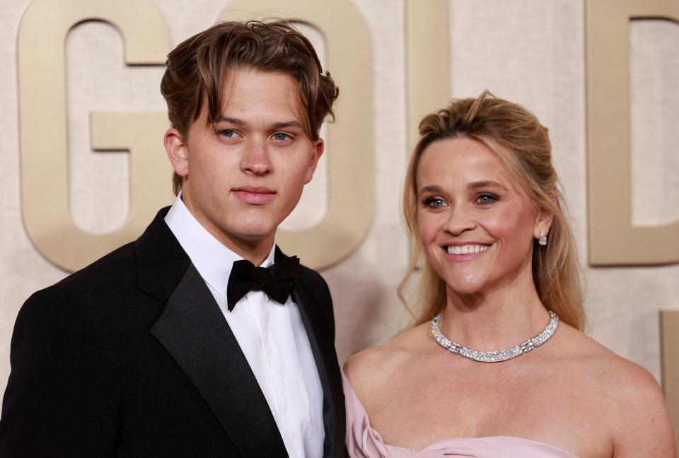Reese Witherspoon and her son Deacon Reese Phillippe arrive for the 81st annual Golden Globe Awards at The Beverly Hilton hotel in Beverly Hills, California, on Jan. 7, 2024.