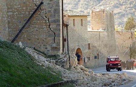 A partially collapsed wall is seen following an earthquake in Norcia, Italy, October 30, 2016. REUTERS/Remo Casilli
