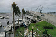 <p>In the aftermath on Sept. 29, several boats sit atop each other in Fort Myers, Florida. </p>