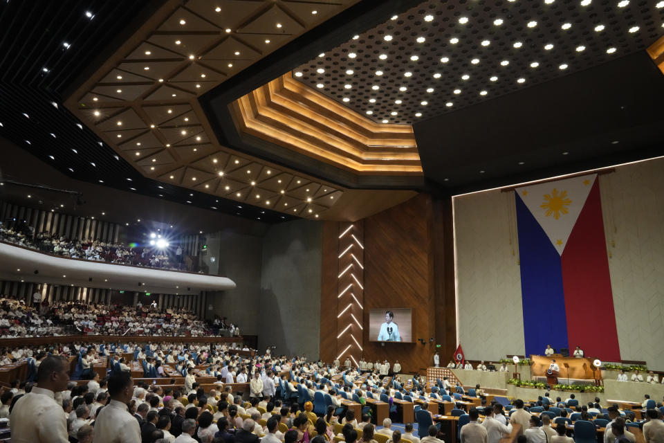 Philippine President Ferdinand Marcos Jr. delivers his second state of the nation address at the House of Representatives in Quezon City, Philippines on Monday, July 24, 2023. Marcos was to deliver a state of the nation speech Monday after his first year in office, which saw him allow an expanded U.S. military presence and refuse to rejoin the International Criminal Court in a move aligned with his predecessor, whose bloody anti-drugs crackdown was under an ICC investigation. (AP Photo/Aaron Favila)