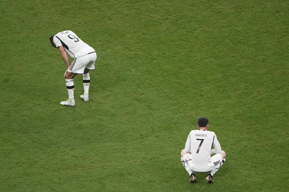 Germany's Niclas Fuellkrug, left, and Germany's Kai Havertz react after the World Cup group E soccer match between Costa Rica and Germany at the Al Bayt Stadium in Al Khor, Qatar, Thursday, Dec. 1, 2022. (AP Photo/Ariel Schalit)