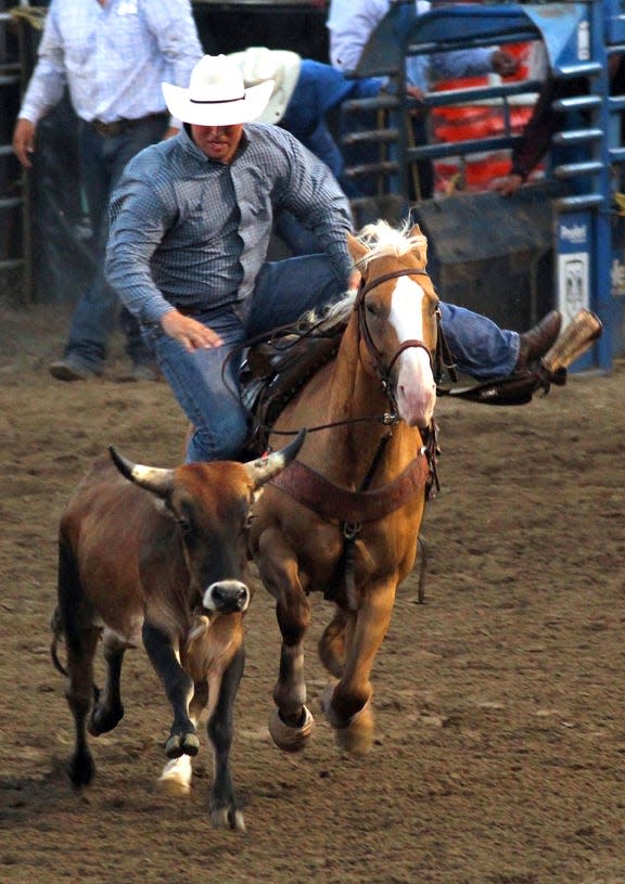 Tyler Kester of York, Nebraska, flies off of his horse during the Steer Wrestling competition at the 93rd Annual Sidney Iowa Championship Rodeo in 2016.