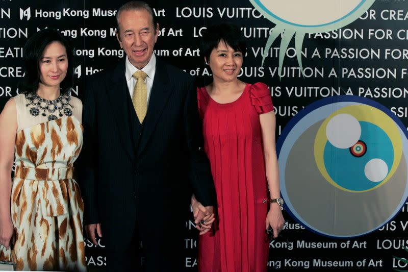 FILE PHOTO: Macau tycoon Stanley Ho, daughter and wife attend opening ceremony of "Louis Vuitton: A Passion for Creation" in Hong Kong