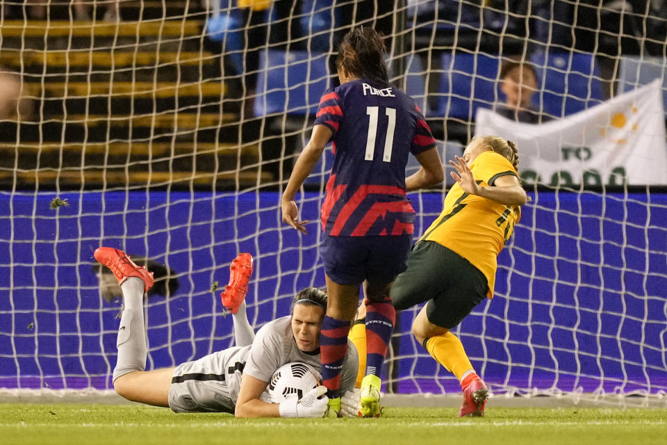 Matilda's goalkeeper Lydia Williams collides with United States' Margaret Purce during the international women's soccer match between the United States and Australia in Newcastle, Australia, Tuesday, Nov. 30, 2021. (AP Photo/Mark Baker)