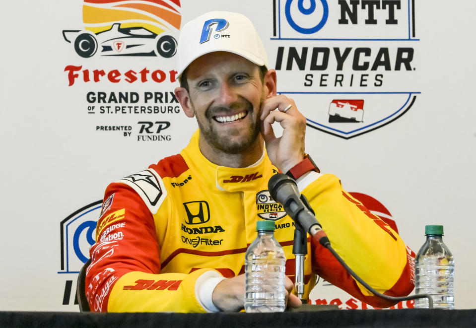Andretti Motorsport driver Romain Grosjean talks to reporters in the media center after winning the pole position during qualifying for the Grand Prix of St. Petersburg auto race Saturday, March 4, 2023, in St. Petersburg, Fla. (AP Photo/Steve Nesius)