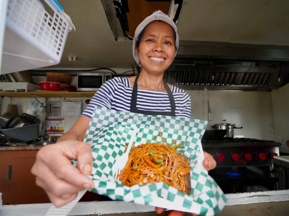 The owner of Thai Pad food truck, Sumitra Burke, has been giving away hot food for free in the days after Fiona hit.  (Martin Trainor/CBC - image credit)