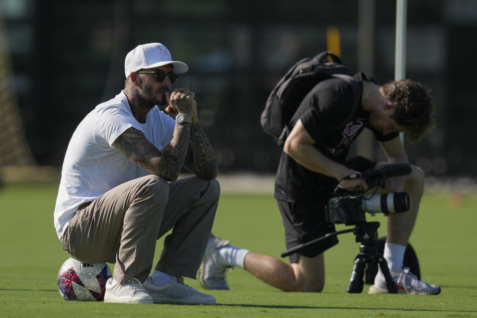 Team co-owner David Beckham watches from the sideline during a training session for the Inter Miami MLS soccer team Tuesday, July 18, 2023, in Fort Lauderdale, Fla.(AP Photo/Rebecca Blackwell)