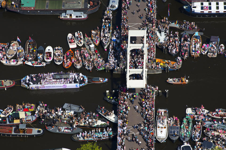 People celebrate the annual Canal Parade