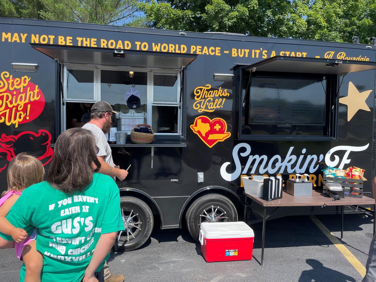 Smokin’ F BBQ parked between Sloan’s Center Hardware and Advance Auto Parts, just off U.S. 411 in Madisonville.