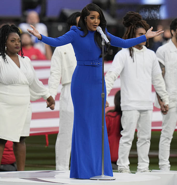 Country music artist Mickey Guyton performs the national anthem before the NFL Super Bowl 56 football game between the Los Angeles Rams and the Cincinnati Bengals, Sunday, Feb. 13, 2022, in Inglewood, Calif. (AP Photo/Chris O’Meara) - Credit: AP