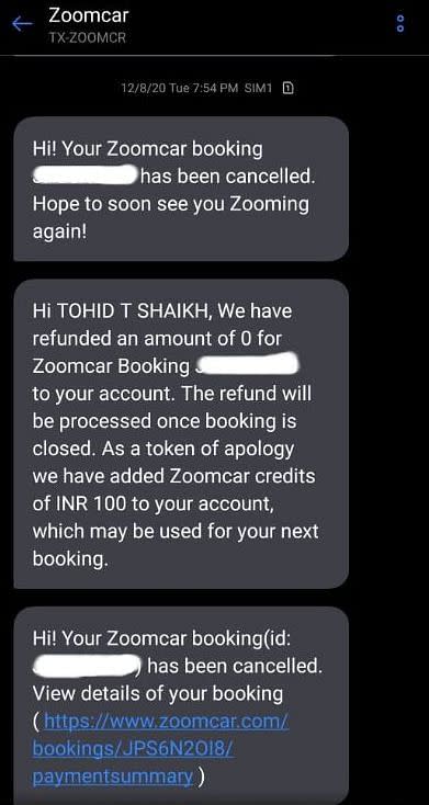 Booking cancellation message sent by Zoomcar on 8 December.