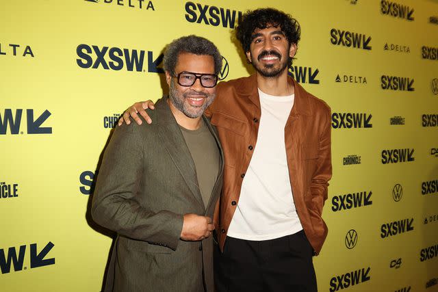 <p>Roger Kisby/Getty Images</p> Jordan Peele and Dev Patel on March 11, 2024