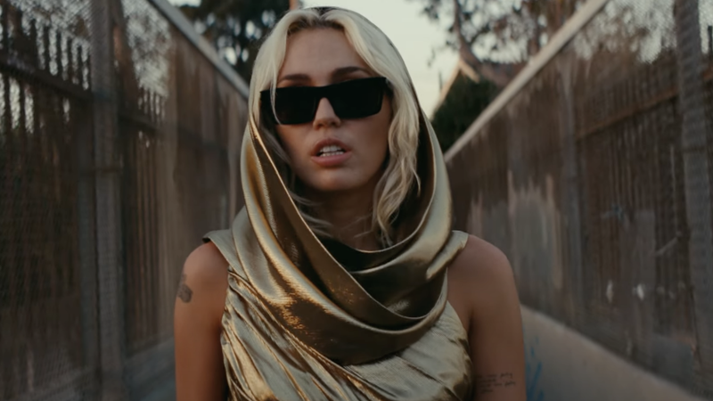 Miley Cyrus in the music video for “Flowers”