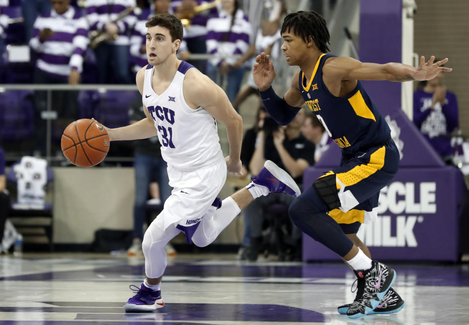 TCU guard Owen Aschieris thought he was in trouble when a police officer interrupted their team meeting. Next thing he knew, he had earned a scholarship. (AP Photo/Tony Gutierrez)