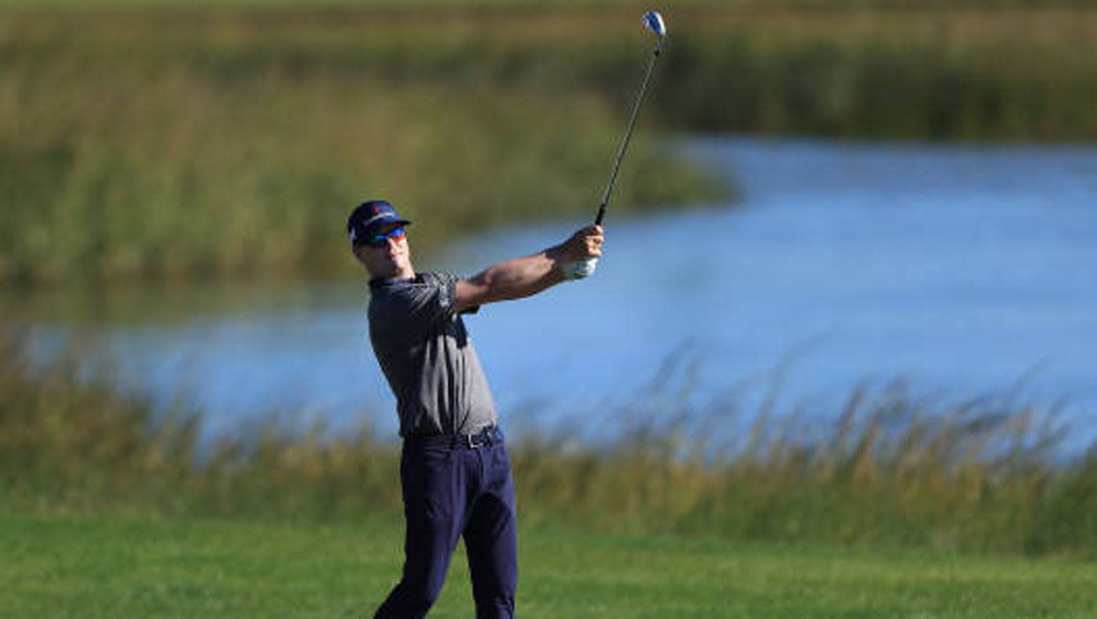 Zach Johnson of St. Simons Island, Ga., hits a tee shot during the 2020 RSM Classic. The tournament has raised more than $28 million for charity since it began in 2010.