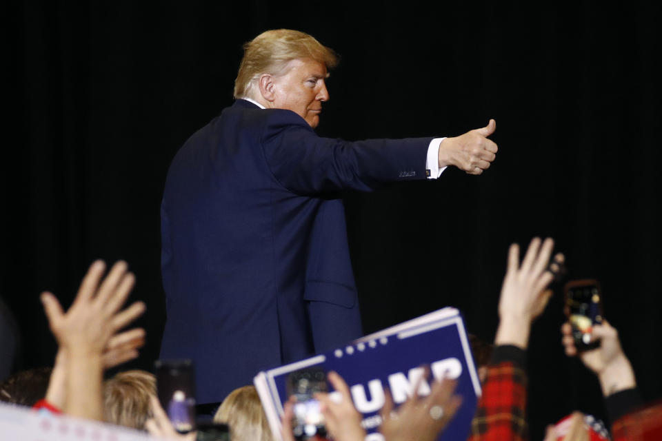 FILE - In this Feb. 21, 2020, file photo, President Donald Trump gives a thumbs-up as he walks offstage after speaking at a campaign rally, in Las Vegas. Vice President Mike Pence has a favorite line when he introduces President Donald Trump at rallies. He says "it's been three years of promises made and promises kept” under Trump. Is it true? The Associated Press reviewed what's happened with Trump's key campaign promises. (AP Photo/Patrick Semansky, File)