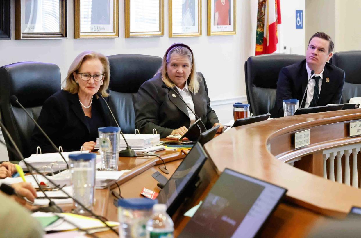 Palm Beach Town Council President Margaret Zeidman, Mayor Danielle Moore, and council member Ted Cooney listen during the May 9 meeting at which the recommendations from the Strategic Planning Board were approved.
