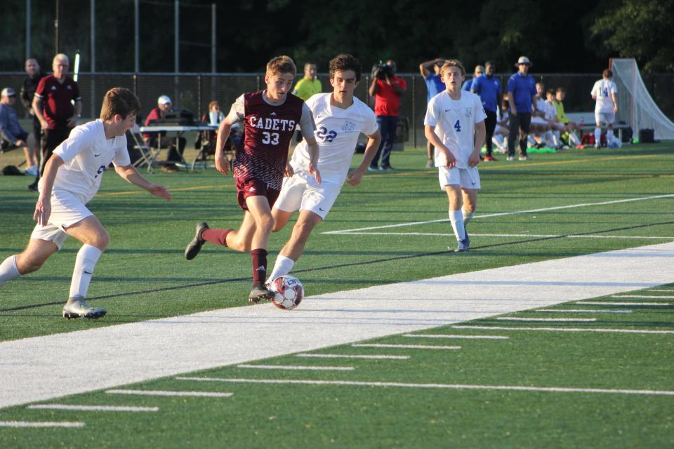 Benedictine's Asher Herrin makes a run toward the goal in a playoff win over West Laurens Thursday.