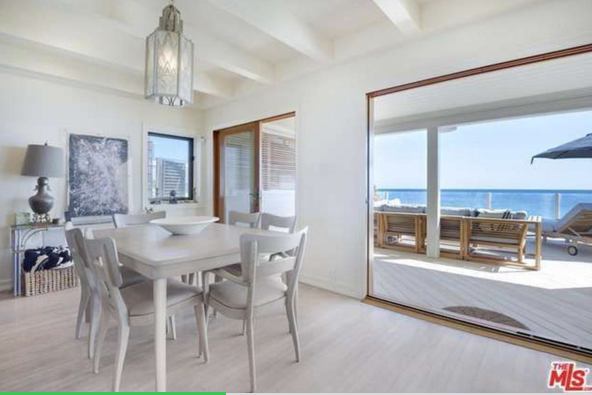 <p>There dining room provides breathtaking views of the ocean. (Trulia.com) </p>