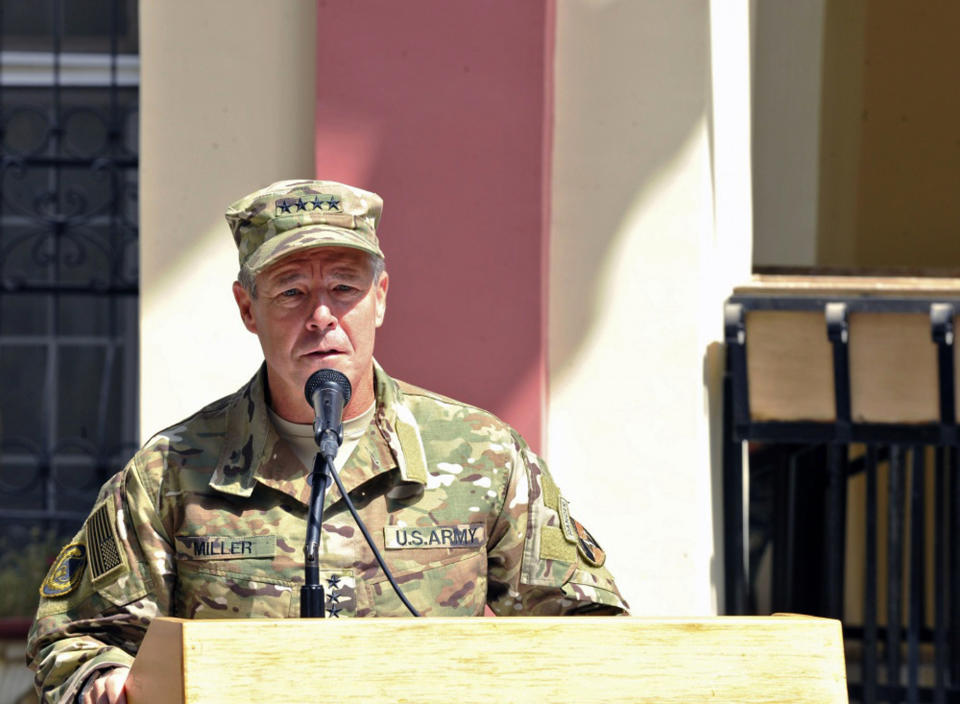 In this September 2, 2018 photo, provided by the U.S. Air Force, U.S. Army Gen. Scott Miller, commander of U.S. and NATO troops in Afghanistan, delivers remarks during the Resolute Support mission change of command ceremony in Kabul, Afghanistan. Afghan officials said Thursday, Oct. 18, 2018 that three top Kandahar province officials have been killed by their own guards in an attack at a security meeting that also wounded two U.S. troops. A Taliban spokesman who claimed responsibility for the attack tells The Associated Press that Miller, was the target. NATO officials say Miller escaped unharmed. (U.S. Air Force/Tech. Sgt. Sharida Jackson, via AP)