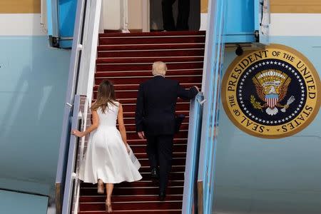 U.S. President Donald Trump and first lady Melania, board upon their departure on Air Force One at Ben Gurion International Airport in Lod near Tel Aviv, Israel May 23, 2017. REUTERS/Amir Cohen