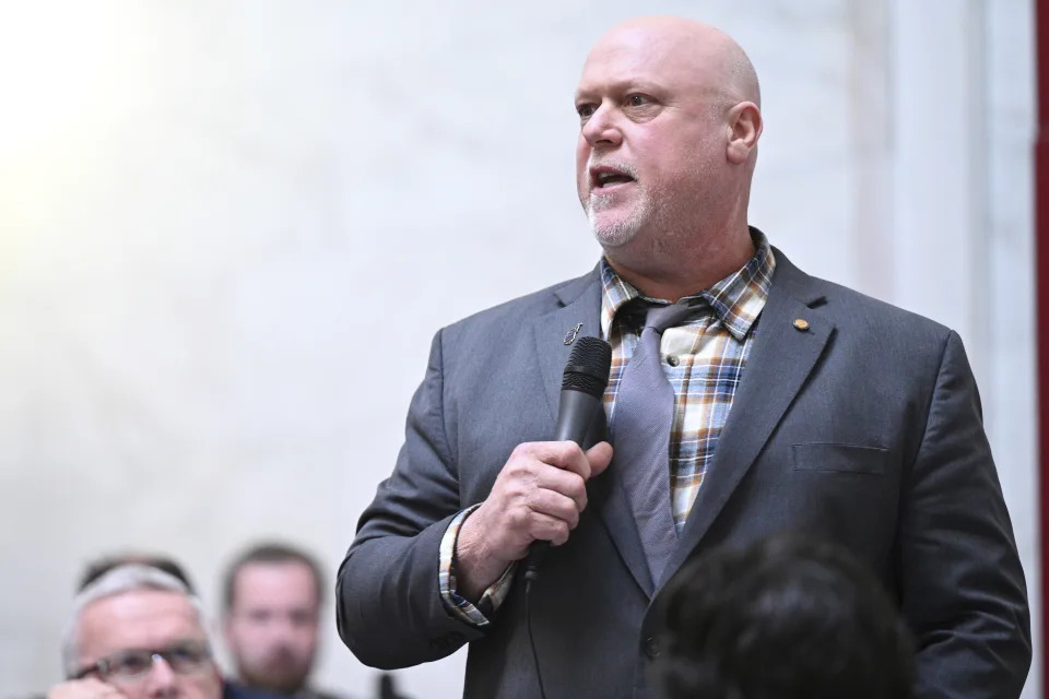 West Virginia Republican Del. Dave Foggin speaks during debate on the House of Delegates floor at the State Capitol in Charleston, W.Va., on Wednesday, Feb. 21, 2024. Foggin spoke in support of a bill that would allow K-12 teachers and other school staff with training to carry firearms and other weapons on public school grounds. (Perry Bennett/West Virginia Legislative Photography via AP)