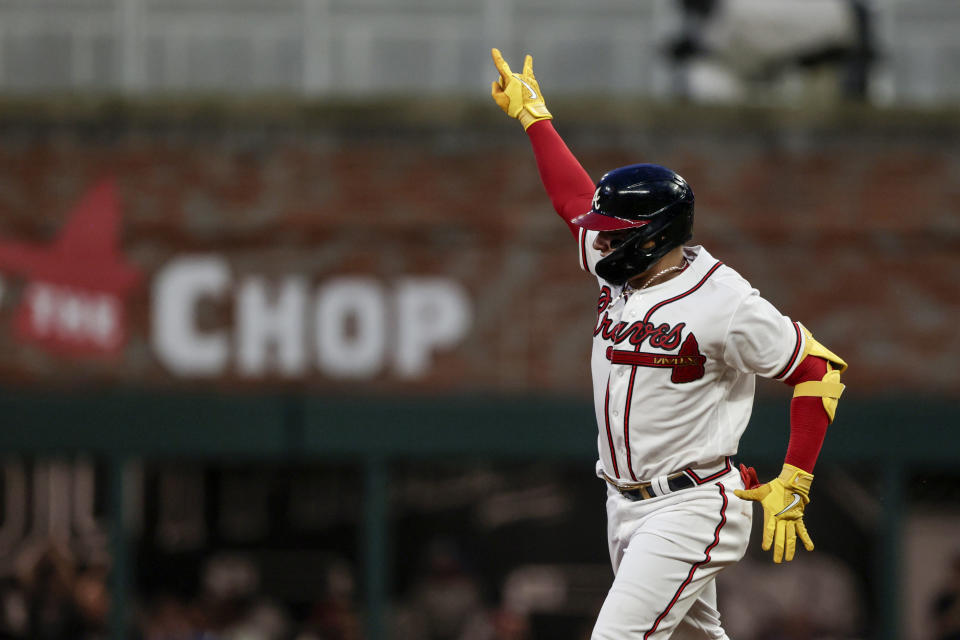 Atlanta Braves' William Contreras celebrates after hitting a home run against the Arizona Diamondbacks during the fourth inning of a baseball game Saturday, July 30, 2022, in Atlanta. (AP Photo/Butch Dill)