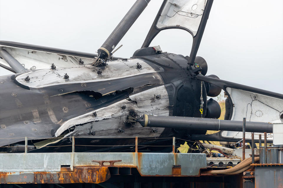 SpaceX plans to salvage the nine Merlin engines from what remains of its first Falcon 9 booster to fly 19 times, including the company's first flight with astronauts aboard. Seen here, the wreckage atop the droneship 