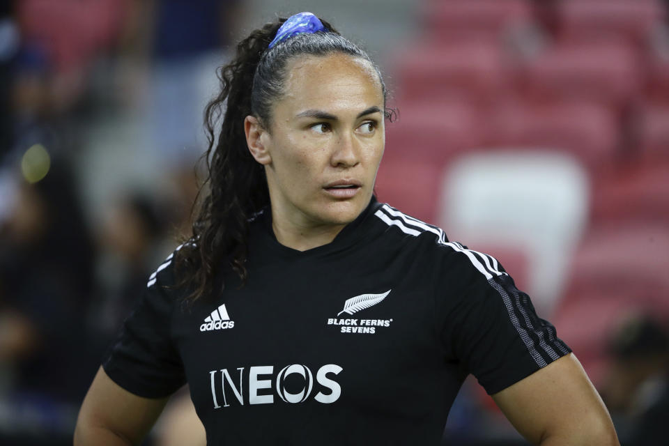 Portia Woodman-Wickliffe of New Zealand in action during HSBC rugby sevens series in Singapore, Sunday, May 4, 2024. Woodman-Wickliffe, the so-called Jonah Lomu of women's rugby, is aiming for another Olympic gold. A silver medalist in 2016 when rugby sevens made its Olympic debut, she was bitterly disappointed after losing the final to Australia. She became an Olympic champion in Tokyo and is determined to defend the title when she lines up in Paris. (AP Photo/Suhaimi Abdullah)