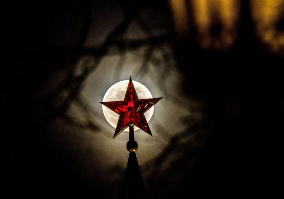 <span class="caption">The image of Russia as a special, isolated place has been reinforced in literature and religion.</span> <span class="attribution"><a class="link " href="https://www.gettyimages.com/detail/news-photo/the-full-moon-rises-behind-one-of-the-kremlin-ruby-stars-in-news-photo/925926674?adppopup=true" rel="nofollow noopener" target="_blank" data-ylk="slk:Mladen Antonov/AFP via Getty Images;elm:context_link;itc:0;sec:content-canvas">Mladen Antonov/AFP via Getty Images</a></span>