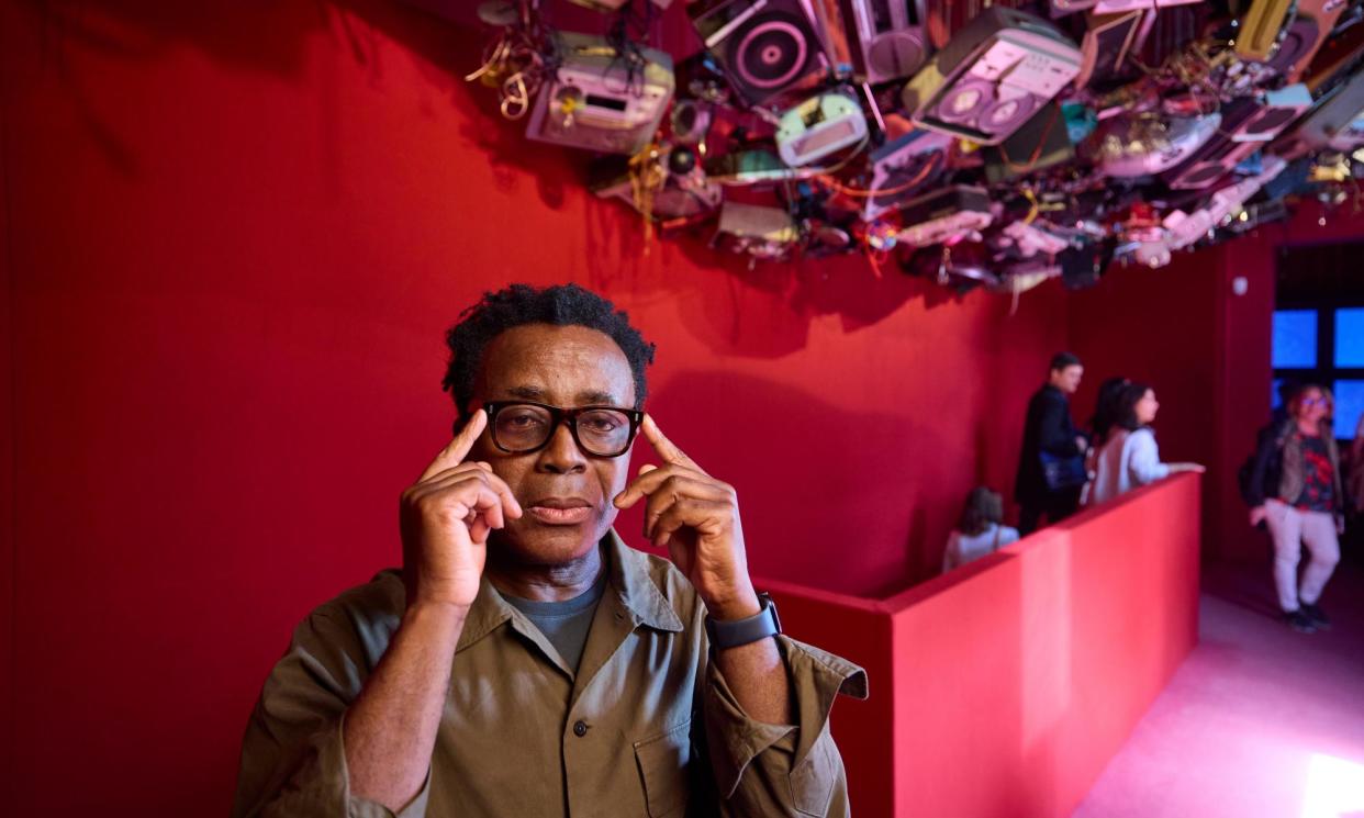 <span>John Akomfrah, pictured inside the British pavilion, says he accepted the invitation ‘without hesitation’.</span><span>Photograph: David Levene/The Guardian</span>