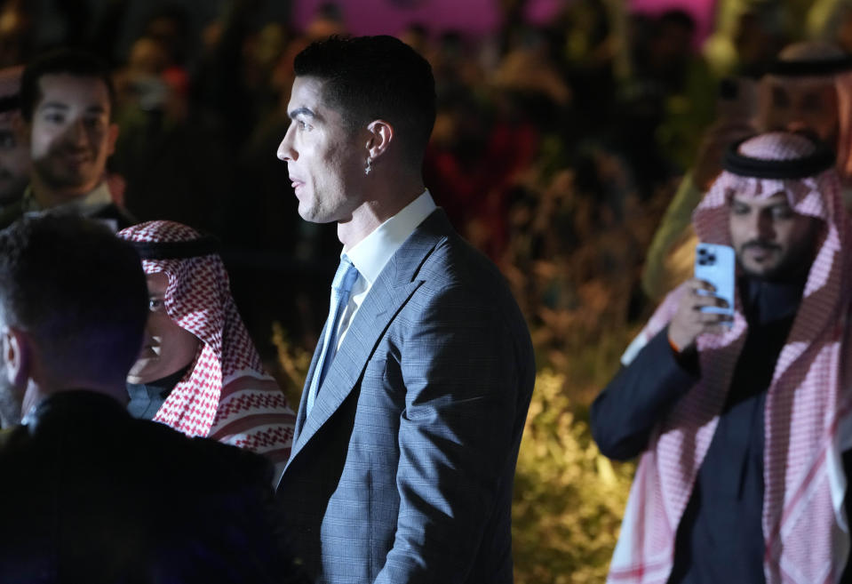 Cristiano Ronaldo arrives for his official unveiling as a new member of Al Nassr soccer club in in Riyadh, Saudi Arabia, Tuesday, Jan. 3, 2023. Ronaldo, who has won five Ballon d'Ors awards for the best soccer player in the world and five Champions League titles, will play outside of Europe for the first time in his storied career. (AP Photo/Amr Nabil)