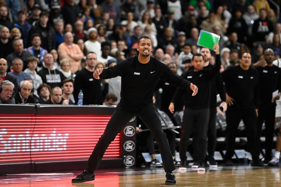 Dec 23, 2023; Providence, Rhode Island, USA; Providence Friars head coach Kim English watches game action against the Butler Bulldogs during the second half at Amica Mutual Pavilion. Mandatory Credit: Eric Canha-USA TODAY Sports