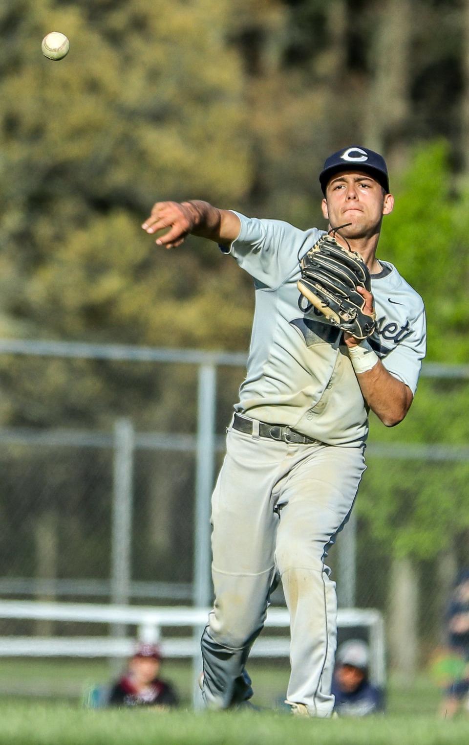 Cohasset's Luc Nivaud throws out a runner during a game against Carver on Thursday, May 12, 2022.