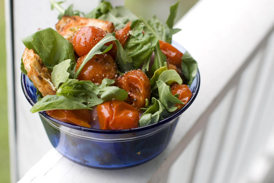 In this image taken on June 10, 2013, a grilled bread and tomato salad is shown served in a bowl in Concord, N.H. (AP Photo/Matthew Mead)