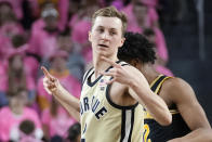 Purdue guard Fletcher Loyer (2) celebrates a three-point basket against Michigan in the second half of an NCAA college basketball game in Ann Arbor, Mich., Thursday, Jan. 26, 2023. (AP Photo/Paul Sancya)