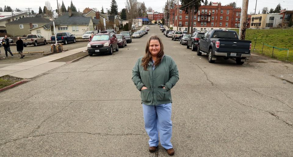 FILE PHOTO - Kimmy Siebens poses for a portrait in the middle of Dr. ML King Way in Bremerton where she does a lot of her outreach with the homeless population, on Wednesday, Feb. 22, 2023.