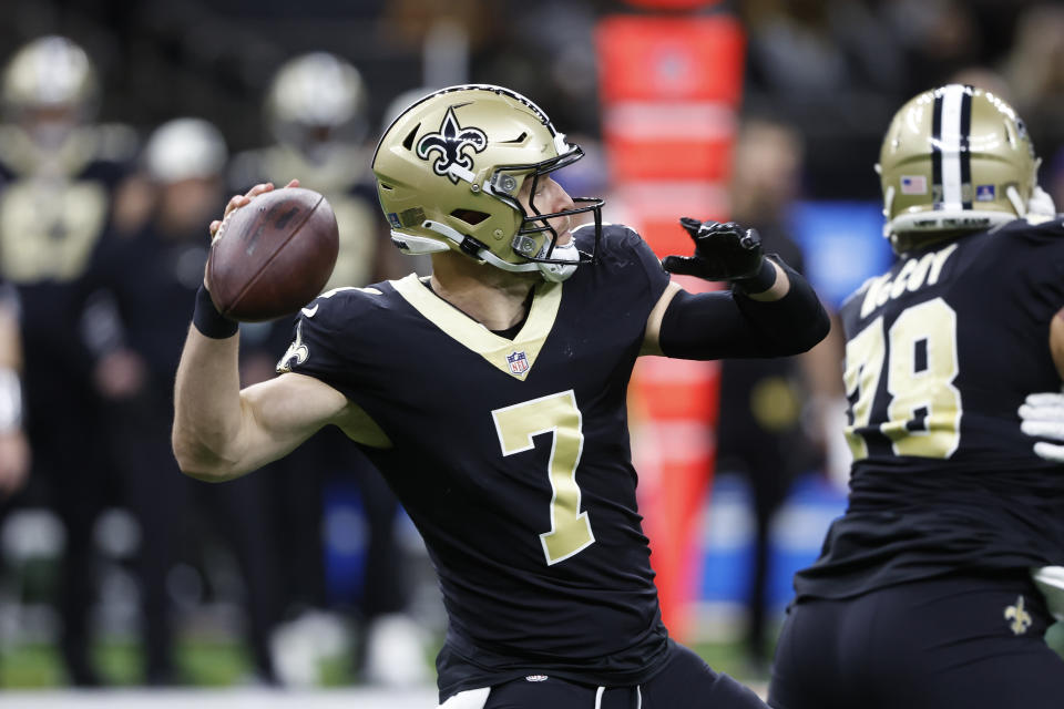 New Orleans Saints' Taysom Hill (7) throws a pass for a touchdown against the Atlanta Falcons in the first half of an NFL football game in New Orleans, Sunday, Dec. 18, 2022. (AP Photo/Butch Dill)